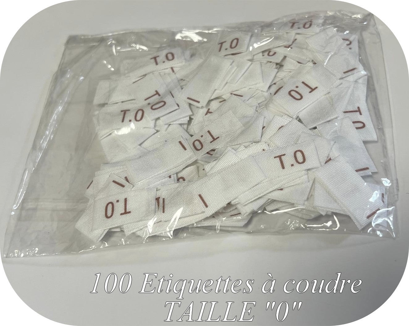 100 Etiquettes De Vêtements Blanches " Tailles 0" Par 100 Pièces Découpées A Coudre, Contexture Pour Confection.
