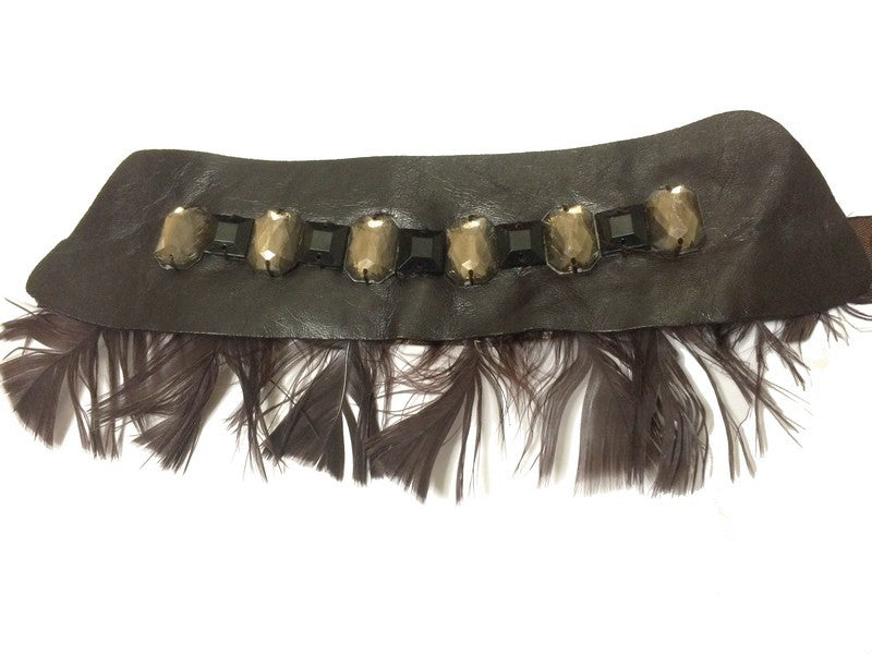 Applique à coudre en cuir et strass.