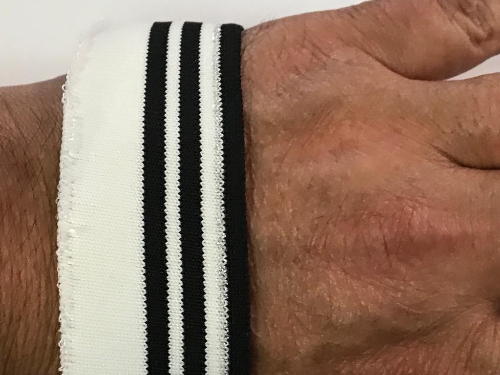 Bord-côte blanc et noir imprimé en fil argenté pour des finitions audacieuses