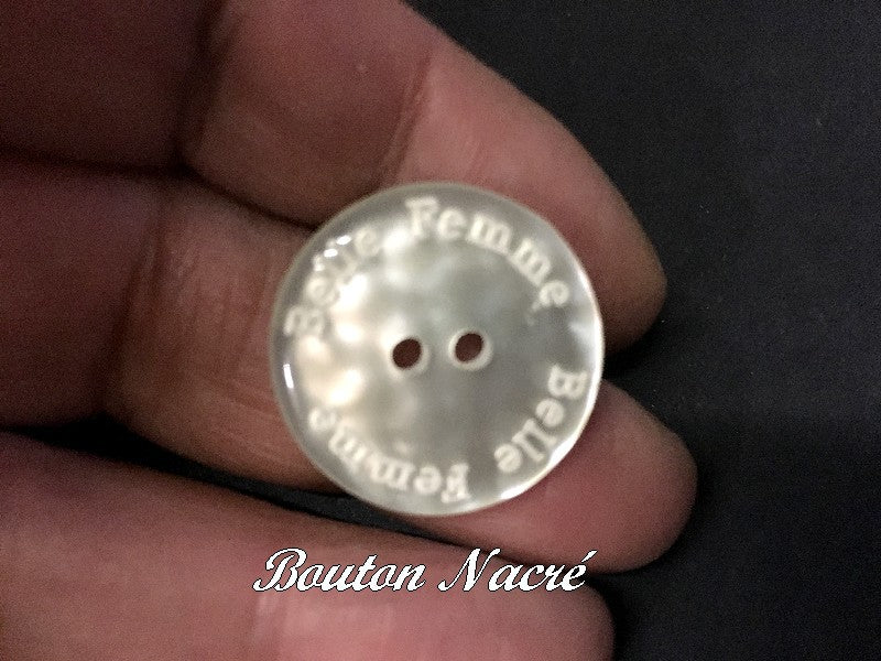 White 2-Hole Pearl Button in Size 22 with "Beautiful Woman" Print for Suits and Jackets.