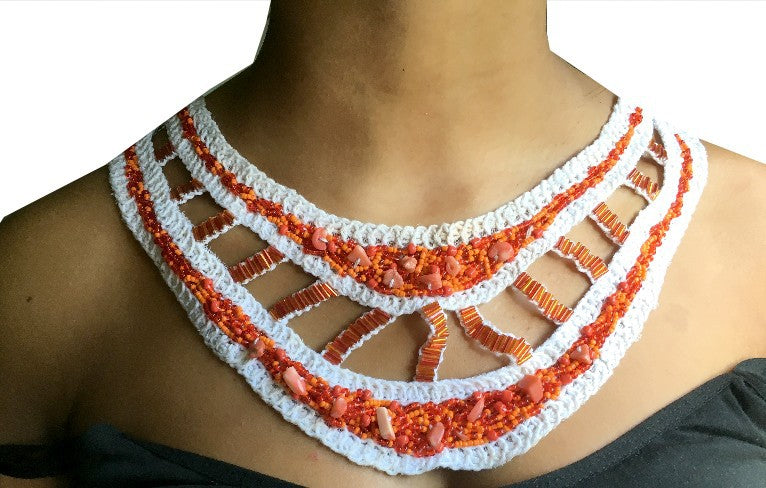 Ecru sew-on collar with red and orange beads
