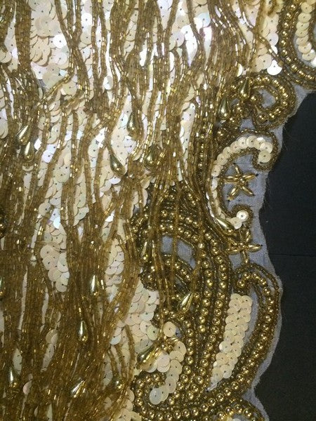 Sew-on bib collar in iridescent sequins and gold beads.