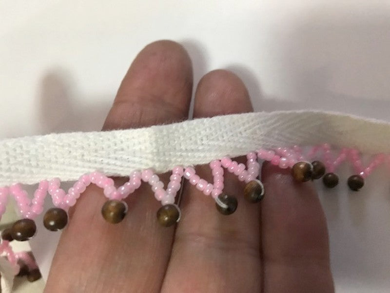 Frange En 2 cm en perlé Rose au mètre sur ruban sergé coton blanc
