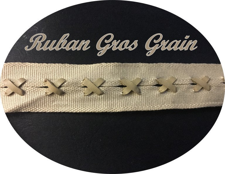 Cinta de grogrén beige por metro con cierres de cordón de piel sintética para coser manualidades y decoraciones.