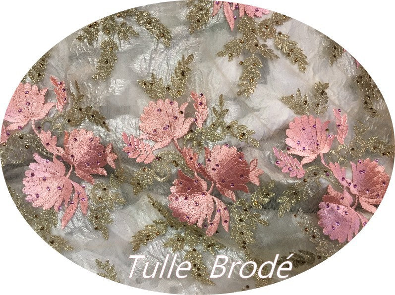 Embroidered Couture Fabric on Flesh-Colored Mesh Tulle with Pink and Gold Flower Patterns.