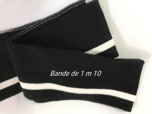 Bord-côte noir avec rayure blanche pour des finitions intemporelles.