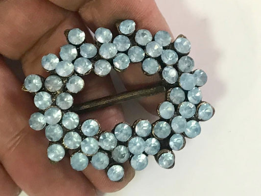 Boucle Strass Ciel : Sublimez vos vêtements avec une touche glamour