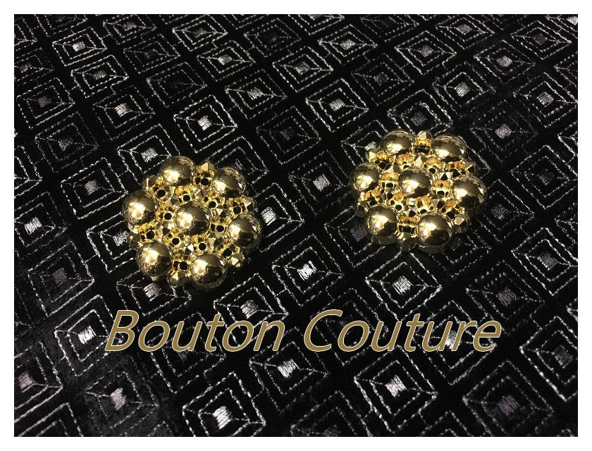 Gold Fancy Sewing Button in Size 35 mm for Customizing Jackets and Coats.