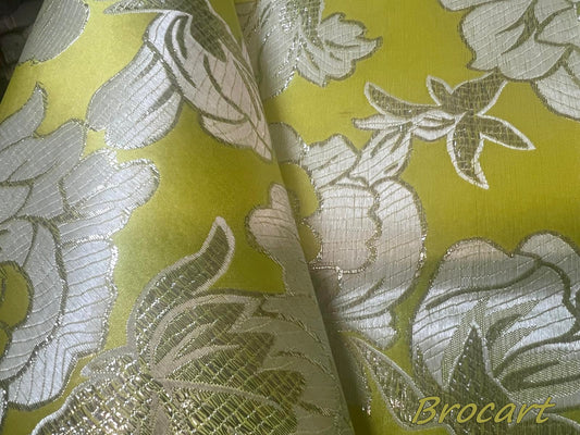 Brocart En Motifs Fleurs Argenté sur Fond en Satin Anis Au Mètre De Luxe En Motifs Fleurs Pour Robes, Tailleurs Et Caftans.