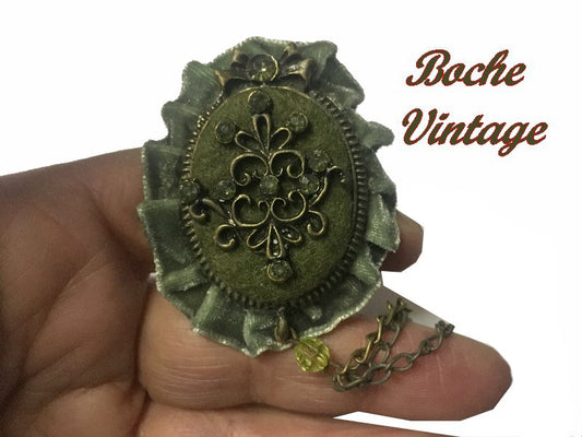 Vintage Khaki Brooch with Rhinestones on a Suede Fabric Backing Decorated with a Bronze Metal Motif for Customizations.