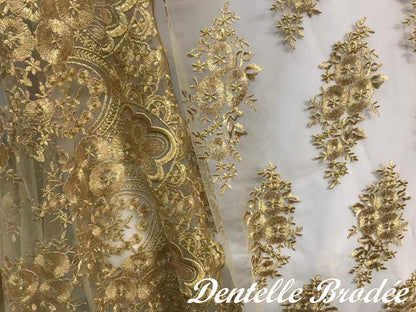 Encaje bordado en oro por metros de alta costura: elegancia brillante en filigrana
