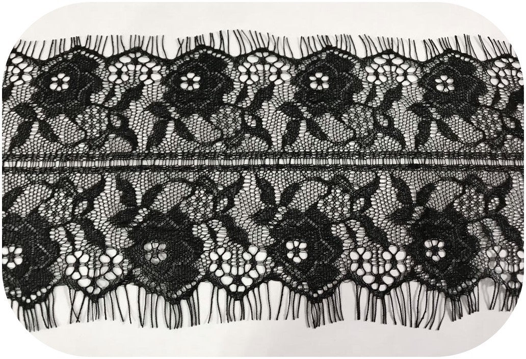 "Black Chantilly Couture Lace in 12 cm: A touch of dark elegance to enhance your creations"