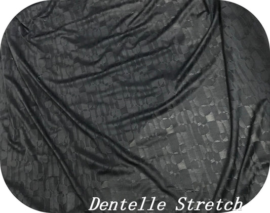 "Dentelle lycra noir brodée de motifs en forme de rondelles : L'élégance pour des créations couture raffinées en noir."