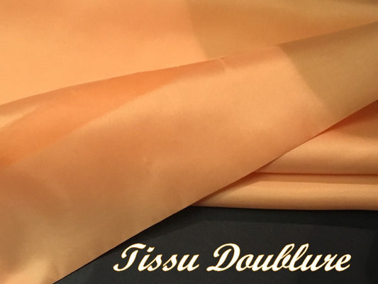 Doublure Polyester Au Mètre En Tissu Couleur Saumon En 150 Cm A Coudre Pour Robes, Manteaux Et Confections.
