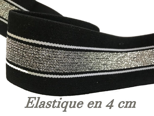 Silver lurex elastic on flat black background 4 cm per meter to sew
