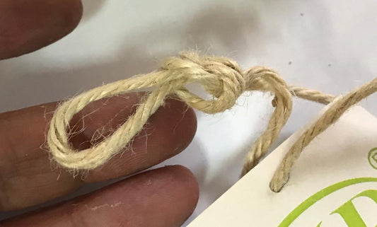 Natural ecru colored jute cord in 4 mm for creative hobbies and lacing.