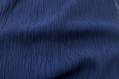 Détail texture plissée coton marine