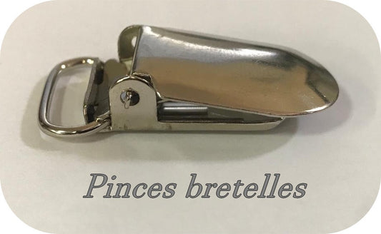 "Pinces à Bretelles métal argenté: Fixation Élégante"