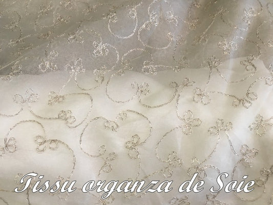 Tissu Haute Couture Au Mètre En Organza De Soie Ecru Et  Imprimé En Motifs Argent Pour Robes De Haut Gamme.