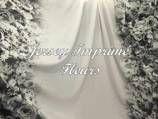 White Lycra Jersey Fabric Printed with Black Floral Patterns by the Meter.