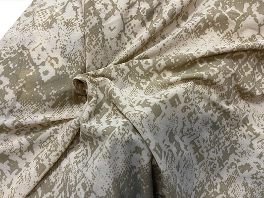 Tela de malla elástica estampada beige por metro