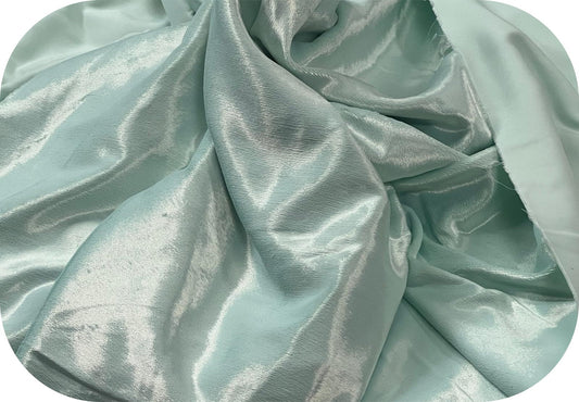 Terciopelo Raspado Verde Mar: Tejido Suave y Lujoso para Moda y Decoración